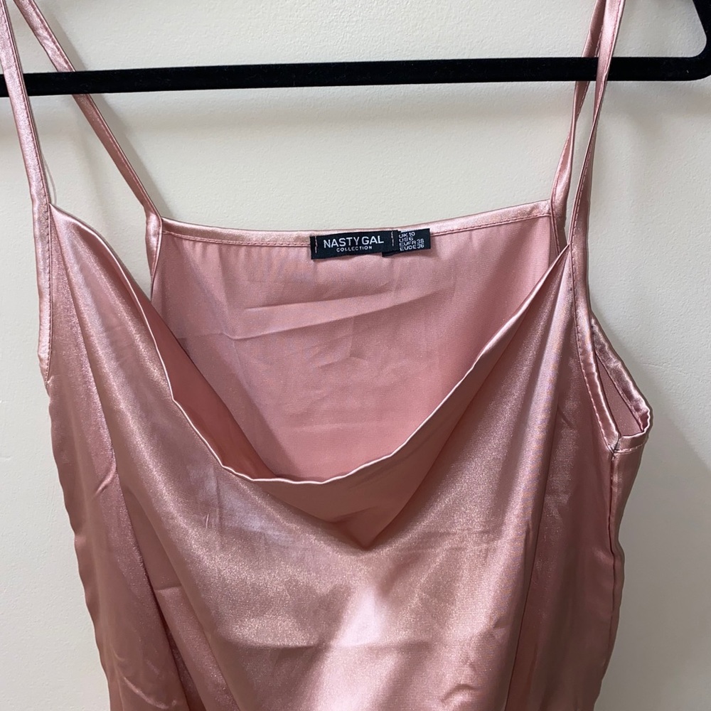 Pink body suit